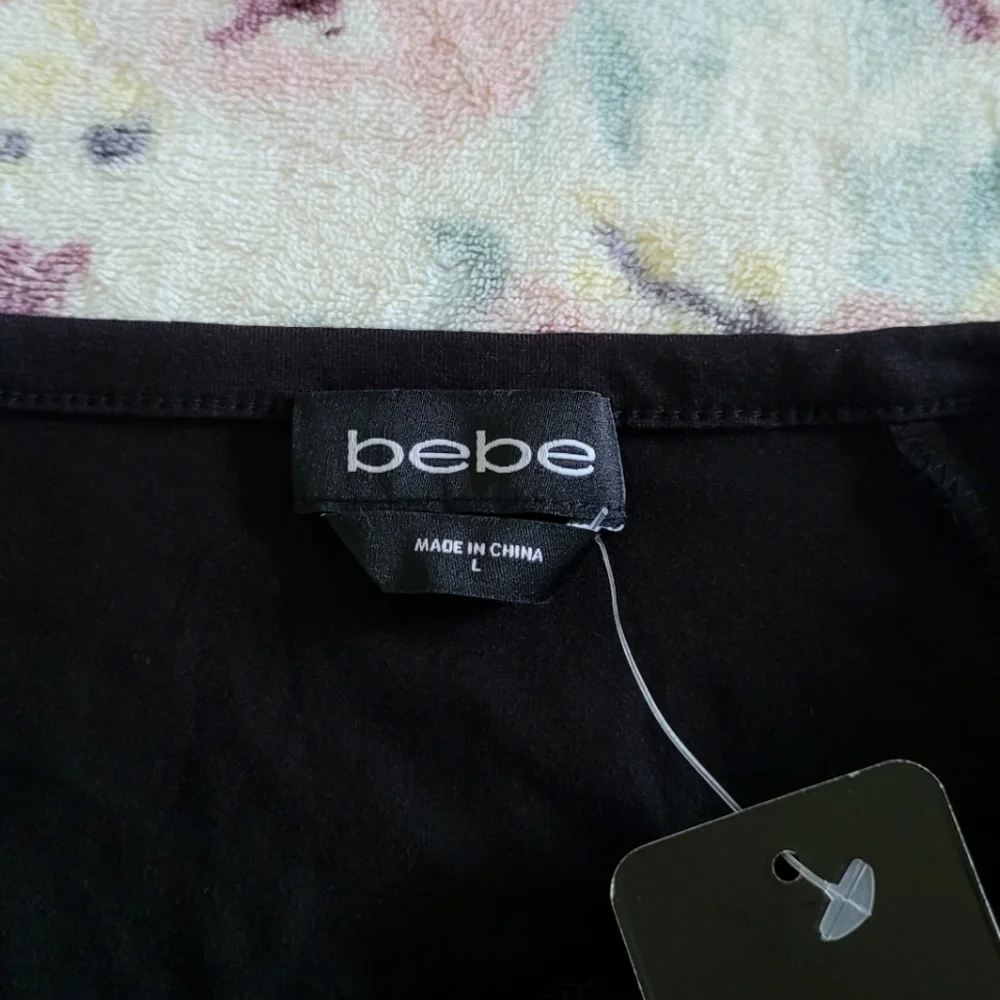 bebe Black🖤 Top with Silver🤍 O-Ring Detail - NWT - Picture 4 of 15